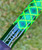 Nick's Custom Rods 2025 Fall Nick's Custom Rods - CTS 1205 Spinning, detailed view of a vibrant green and blue patterned fishing rod handle with a glossy finish.