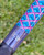 NICK'S CUSTOM RODS 2025 Fall Nick's Custom Rods - CTS 1205 Spinning, close-up of the colorful geometrical patterned handle on a fishing rod with the Frank & Fran logo.