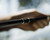 Toadfish Elite Stowaway Travel Rod, close-up of the black fishing rod with blue accents, highlighting its design for travel and portability.