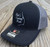 Nick's Custom Rods, men's trucker hat with embroidery and mesh back on wooden surface.