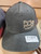 F&F Offset Embroidered Logo Hat, black and brown baseball cap with embroidered text and logo on front, adjustable strap, and ventilation eyelets.