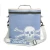 CALCUTTA Calcutta Renegade TPU Cooler, light blue cooler bag with skull and crossbones design, adjustable shoulder strap, and insulated interior for keeping items cool.