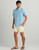 HUK Shoreside Short Solid, Light-colored casual shorts worn by a male model.