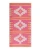 SAND CLOUD Sand Cloud Beach Towels, colorful pink and yellow patterned beach towel with geometric design and fringed edges.