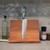 TOADFISH Toadfish 8-inch Abalone Chef Knife, showcasing the knife with abalone shell handle mounted on a wooden cutting board in a kitchen setting.