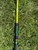 Full Send Rod Co. Custom CTS 1205 fishing rod, green and purple color scheme, lying on grass.