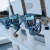 TOADFISH Toadfish Stono Combo, image of fishing reels mounted on a boat for saltwater fishing.