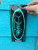TORMENTER Tormenter Sticker, vinyl window decal in neon blue with skeletal design.