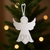 Silver plate angel ornament with engraved details.