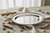 Polished aluminum oval tray with rope edging.
