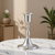 Pewter candlestick with elegant colonial design.