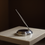 Pewter pen holder with beaded detailing.