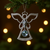 Pewter angel ornament with aquamarine jewel.