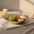 Pewter fruit bowl with elegant design.