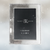 Silver photo frame with polished finish.