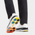 G-Fore Gallivan2R G/Lock Tuxedo Golf Shoe - Snow/Onyx | Equipped with an auxetic lattice midsole, integrated rubber cleat system, heel cap, cushioned interior, and antimicrobial mesh lining, its ultra lightweight and comfortable design comes with fully locked-in stability for every swing.