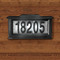 Solar powered address light includes hardware, and two pre-drilled keyhole hangers, to hang the sign on your wall or entrance column.