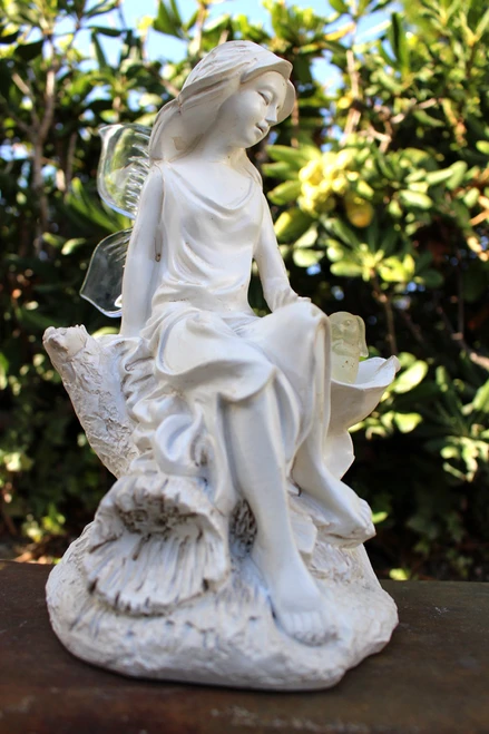 Fairy solar statue  With Soft White LED that light up the Fairy Wings and Bunny Rabbit.