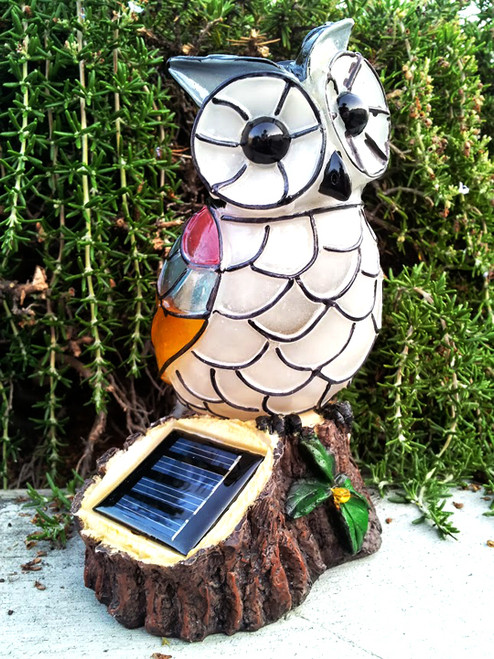 Owl solar lights has a warm white LED.