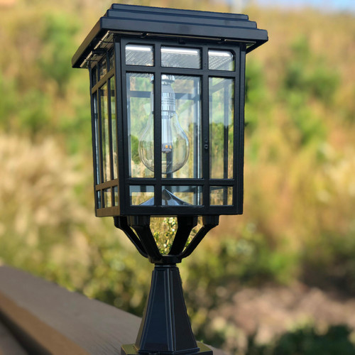 Solar coach lantern is made from powder coated cast aluminum, with glass lenses and a Black finish.