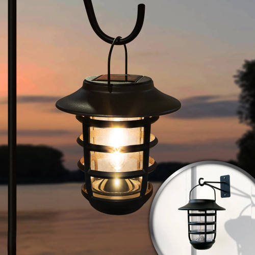 Hanging solar wall and walkway lights are made from stainless steel, cast aluminum and glass, and include 3000K Warm White LED in an Edison Style bulb.