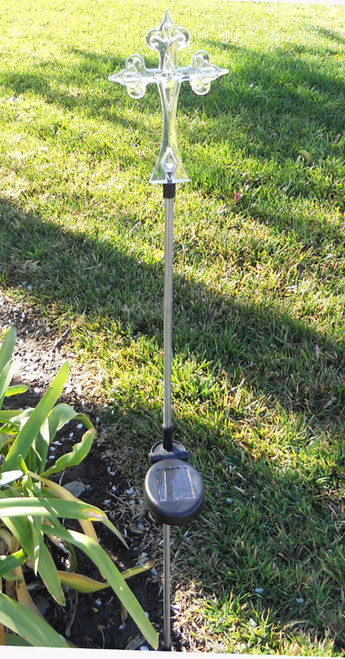 Cross color changing solar lights have an elegant scroll design on the 6.8 Inch solar Cross, and stand over 32 inches high.