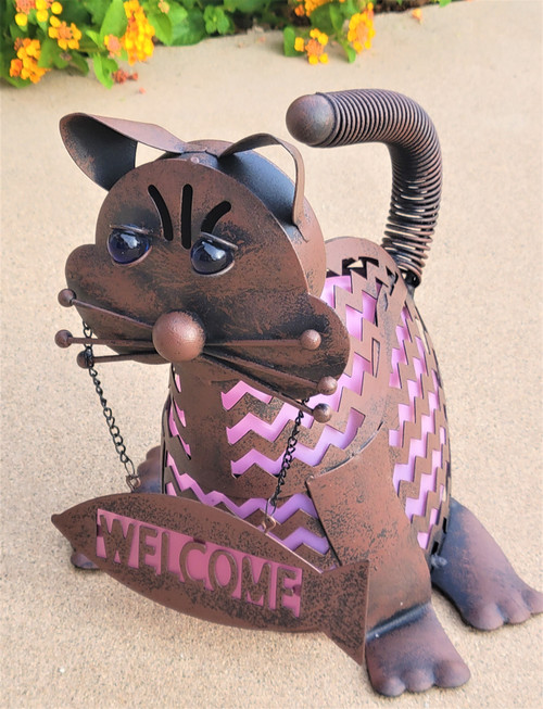 Animal shaped solar light named Princess holds a Fish Welcome Sign to greet you at your door.