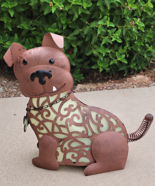 Solar animal garden light is a dog statue made from metal, with PVC film that forms his dog body, and is 15 inches long x 5.75 inches wide x 15 inches high.