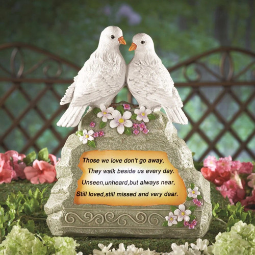 Doves solar memorial stone expresses how we feel about our loved one that has passed, Those we love don't go away,
They walk beside us every day.