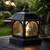 Enjoy the beauty of the Edison Black solar table lantern on your patio and deck tabletop every night and during family gatherings.
