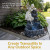 Cascade solar powered fountain includes a water pump that re-circulates the water throughout the rocky tiers.