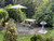Country Gardens 2-Tier solar powered water fountain installed in a relaxation garden area. Picture provided by our special customer, Carol.