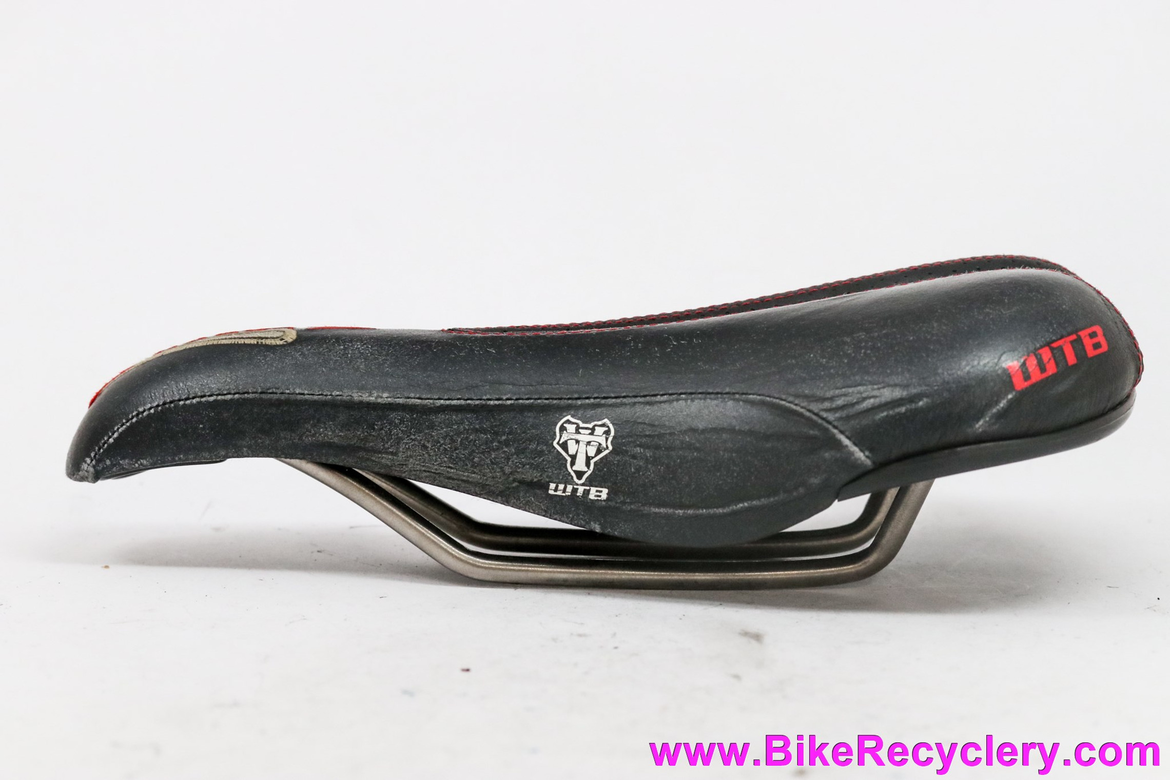 WTB Laser V Titanium Saddle: Black Leather w/ Red Stitching - 1st Gen -  Bike Recyclery