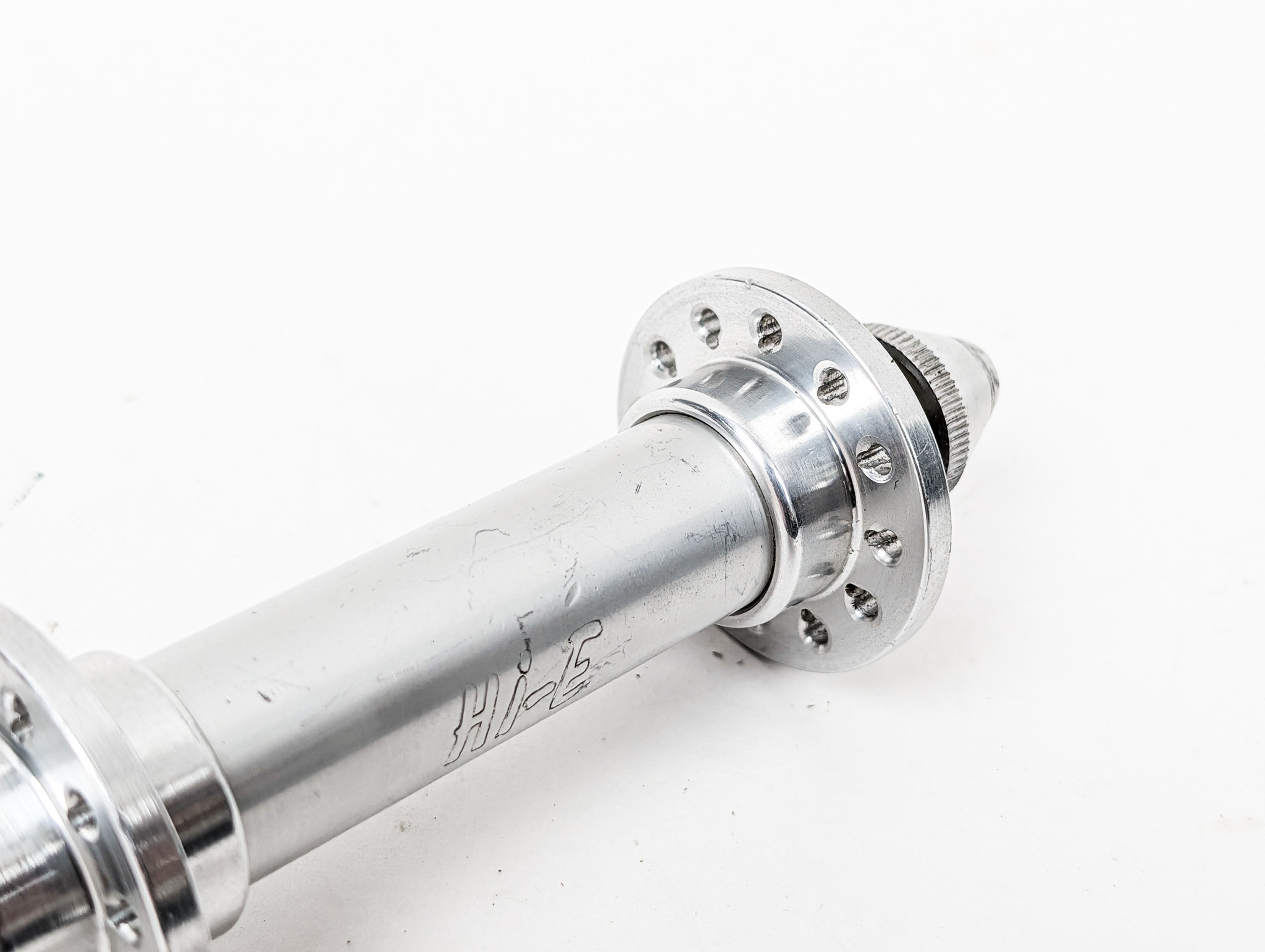 Hi-E Front Hub & QR Skewer: Low Flange - 24H Bladed - Silver - Engraved Logo (Near Mint Perfect Bearings)