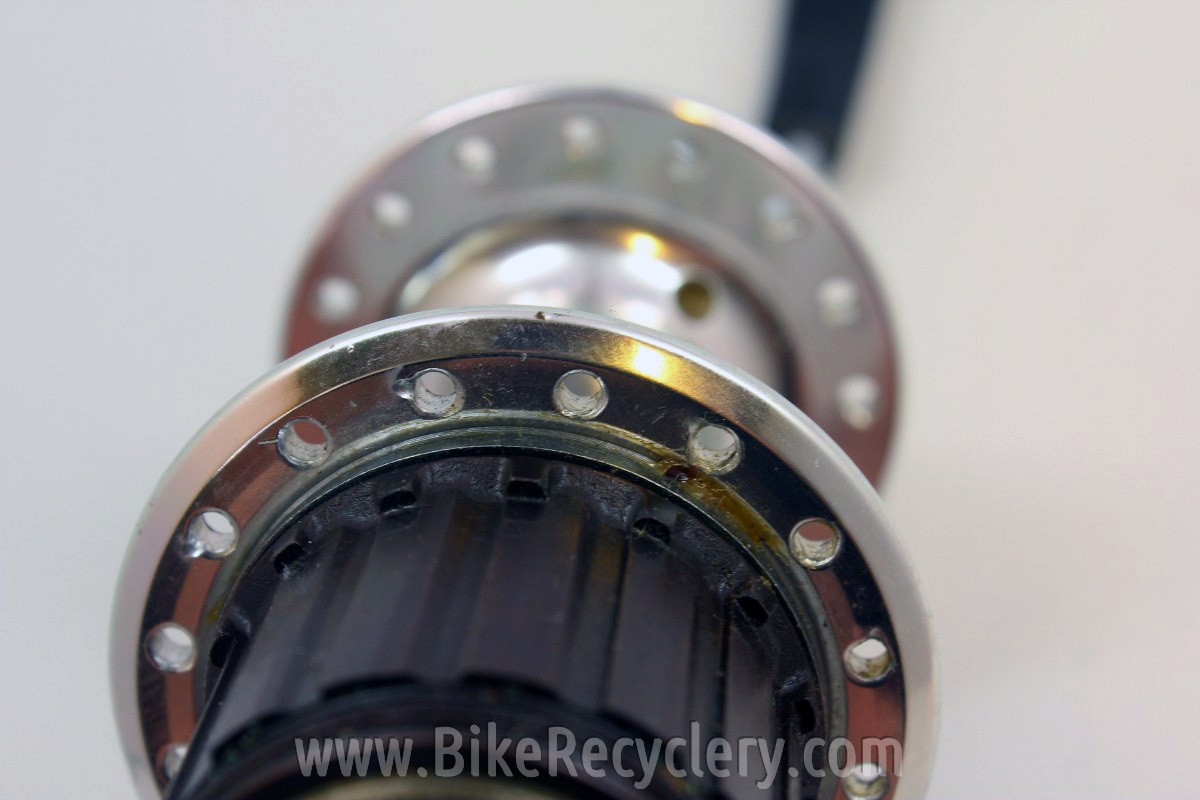 Suntour XC Pro Rear Hub: 7-Speed MicroDrive, WTB Grease Guard 32H