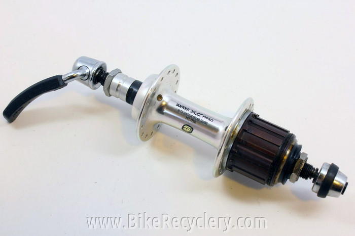 Suntour XC Pro Rear Hub: 7-Speed MicroDrive, WTB Grease Guard 32H 