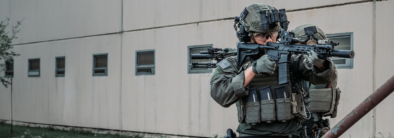 Military operator out in the field wearing one of FirstSpear's modular armor platform set-ups. 