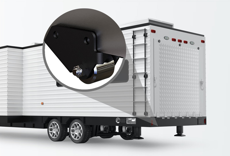 Image of back of trailer with close up of a drag wheel