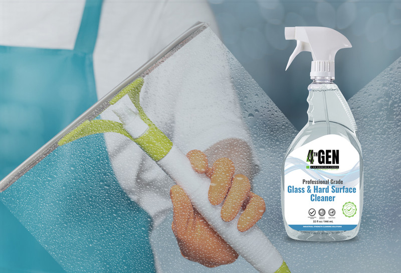Person cleaning window and bottle of 4TH GEN glass and hard surface cleaner