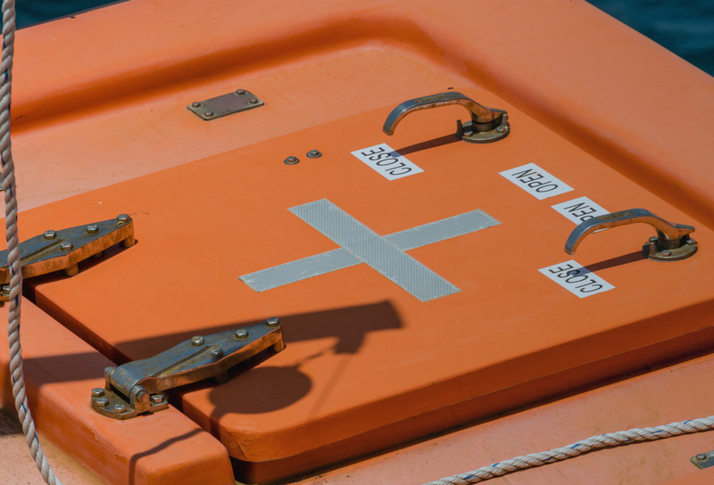 Hatch door on ship showing hinges and handles