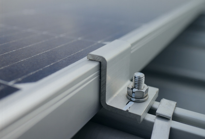 Close up of fastener on frame for solar panel