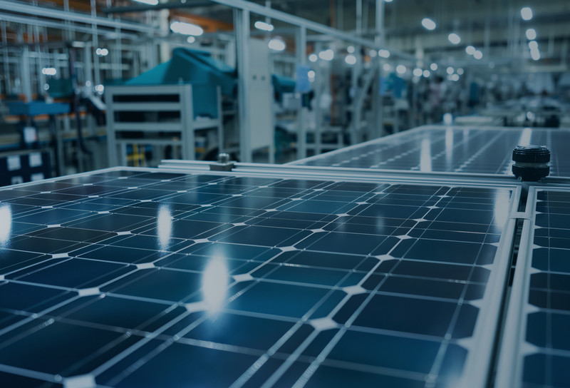 Solar panels being manufactured in factory