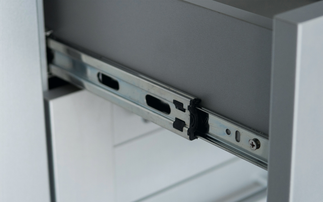 Drawer slide on cabinet