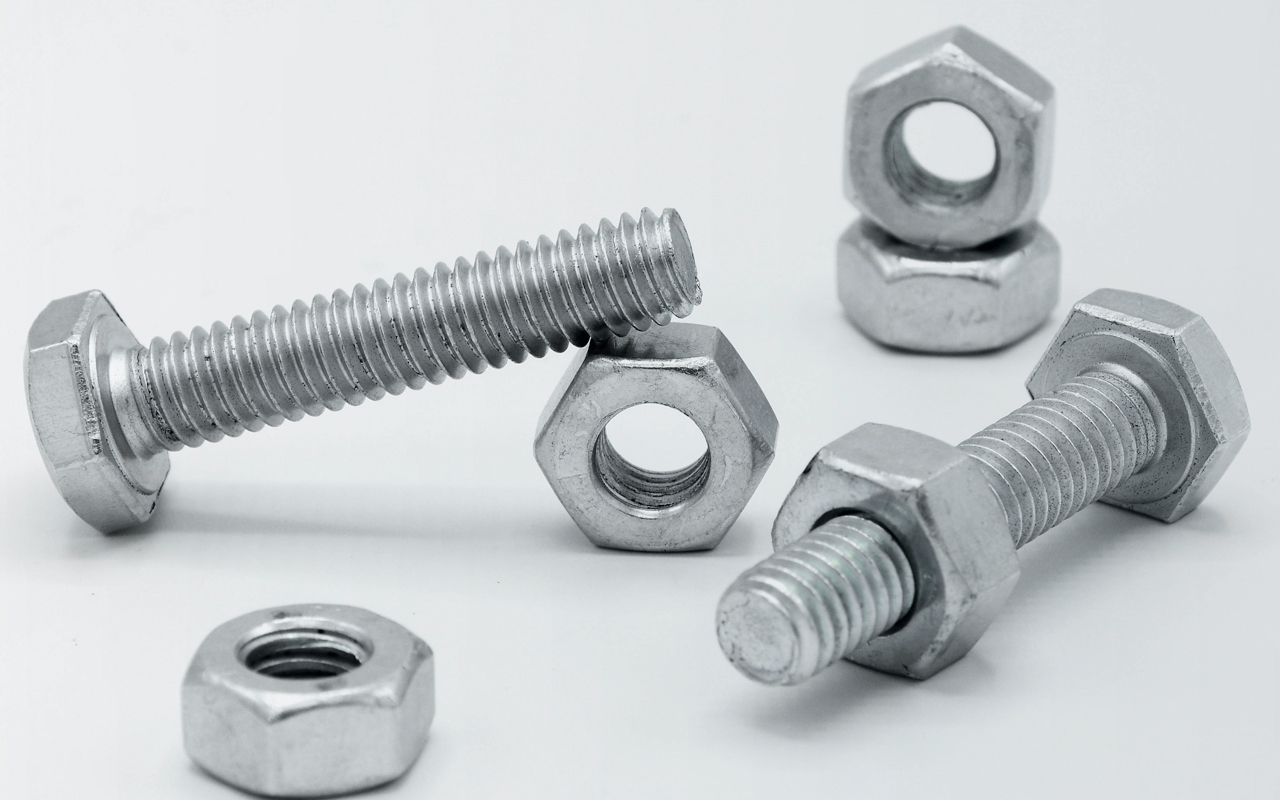 Nuts and bolts on white background