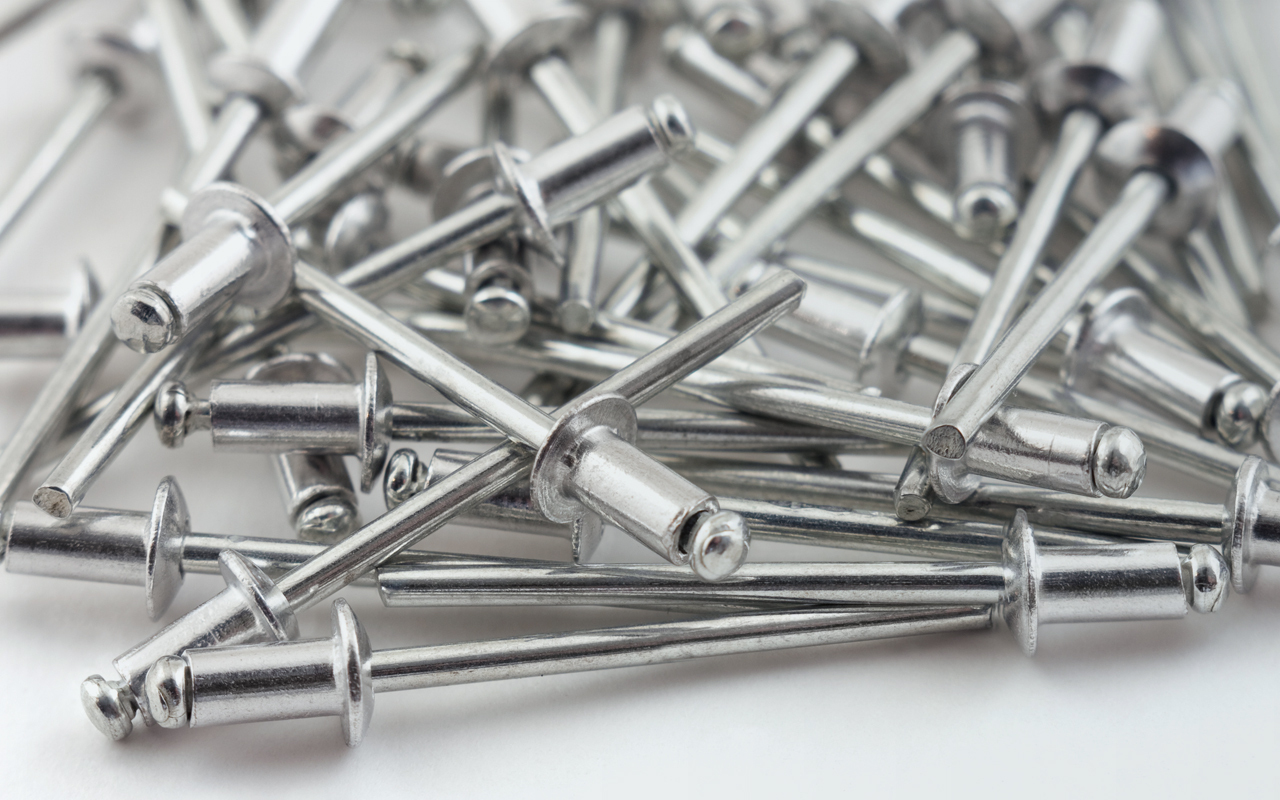 Group of rivets on white background