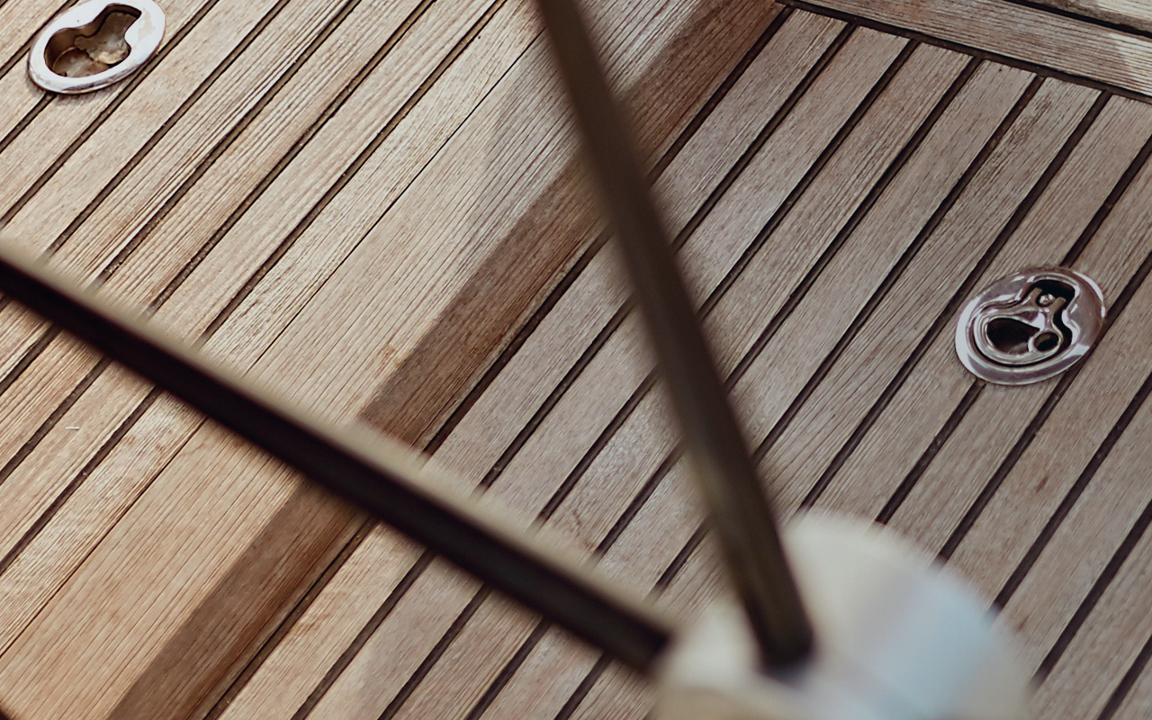 Boat deck showing latches to compartments below