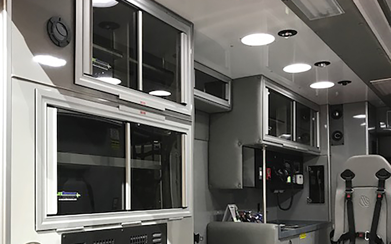Inside of an ambulance showing LifeDefender cabinets by Austin Hardware