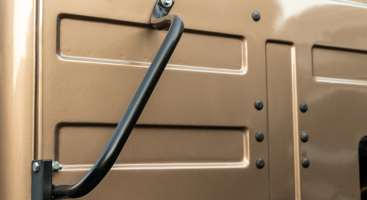 Heavy duty grab handle on military vehicle