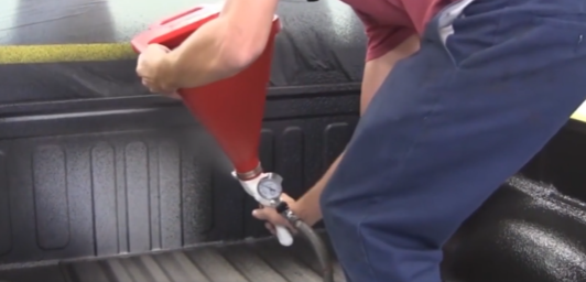 Scorpion Coating Being Sprayed into  Truck