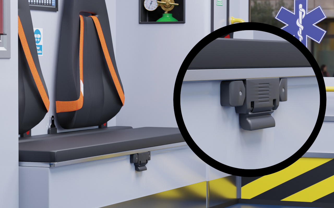 Bench inside of an ambulance showing the Austin Hardware squad bench latch